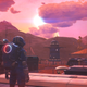 A spaceperson looks out over a pink and purple planet in this screenshot from No Man's Sky.